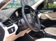 BMW X1 sDrive18i 2018 - Cần bán lại xe BMW X1 sDrive18i đời 2018, màu trắng, nhập khẩu như mới