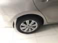 Toyota Vios 2016 - Cần bán xe Toyota Vios 1.5E 2016, số tự động, màu vàng cát