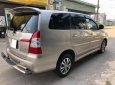 Toyota Innova 2015 - Xe Toyota Innova đời 2015, màu vàng, số sàn, giá 533tr