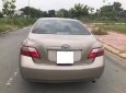 Toyota Camry LE 2.4AT 2007 - Bán gấp xe Toyota Camry LE đời 2007 số tự động, màu nâu vàng