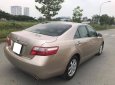 Toyota Camry LE 2.4AT 2007 - Bán gấp xe Toyota Camry LE đời 2007 số tự động, màu nâu vàng