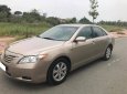 Toyota Camry LE 2007 - Nhà cần tiền bán gấp xe Toyota Camry LE đời 2007 số tự động, màu nâu vàng