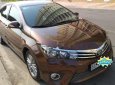Toyota Corolla altis 2014 - Cần bán xe Toyota Corolla altis năm sản xuất 2014, màu nâu xe gia đình