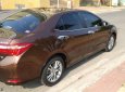 Toyota Corolla altis 2014 - Cần bán xe Toyota Corolla altis năm sản xuất 2014, màu nâu xe gia đình