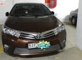 Toyota Corolla altis 2014 - Cần bán xe Toyota Corolla altis năm sản xuất 2014, màu nâu xe gia đình