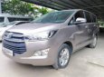 Toyota Innova E 2016 - Bán Toyota Innova E sản xuất 2016, màu bạc, số sàn 