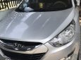 Hyundai Tucson 2011 - Cần bán lại xe Hyundai Tucson sản xuất năm 2011, màu bạc, xe nhập 