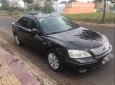Ford Mondeo   2V  2006 - Bán Ford Mondeo 2V đời 2006, màu đen, xe đang sử dụng không lội nước và cấn mốp