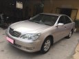 Toyota Camry 2004 - Cần bán gấp Toyota Camry đời 2004, màu xám, số sàn