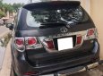 Toyota Fortuner 2014 - Gia đình cần bán Fortuner 2014, số tự động, máy xăng, màu xám trì