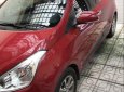 Hyundai Grand i10 2016 - Bán lại xe Hyundai Grand i10 đời 2016, màu đỏ, nhập khẩu nguyên chiếc