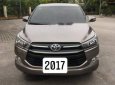 Toyota Innova   E MT  2017 - Bán xe Innova E MT số sàn, đời 2017, màu nâu đồng, biển tỉnh