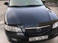 Mazda 626   2001 - Bán Mazda 626 sản xuất năm 2001, màu đen, xe vừa bọc lại da nội thất