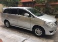 Toyota Innova  2.0E  2014 - Bán chiếc xe Innova 2.0E màu bạc, Sx cuối năm 2014, chính chủ nhà tôi đi từ đầu