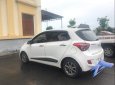 Hyundai Grand i10 2015 - Bán ô tô Hyundai Grand i10 2015, màu trắng, máy êm ru