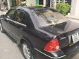 Ford Laser 2004 - Chính chủ bán ô tô Ford Laser đời 2004, màu đen