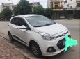 Hyundai Grand i10 2015 - Bán ô tô Hyundai Grand i10 2015, màu trắng, máy êm ru