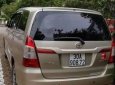 Toyota Innova  E 2.0   2015 - Bán Toyota Innova E 2.0 sản xuất năm 2015, màu bạc xe gia đình