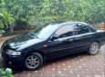 Mazda 323   1999 - Lên số tự động bán Mazda 323 1999, màu đen