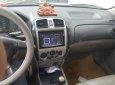 Ford Laser GHIA 1.8 MT 2003 - Bán Ford Laser GHIA 1.8 MT 2003, màu bạc, giá tốt