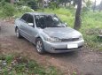 Ford Laser GHIA 1.8 MT 2003 - Bán Ford Laser GHIA 1.8 MT 2003, màu bạc, giá tốt