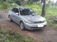 Ford Laser GHIA 1.8 MT 2003 - Bán Ford Laser GHIA 1.8 MT 2003, màu bạc, giá tốt