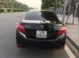 Toyota Vios E 2014 - Cần bán gấp Toyota Vios E sản xuất 2014, màu đen xe gia đình