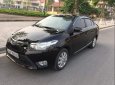 Toyota Vios E 2014 - Cần bán gấp Toyota Vios E sản xuất 2014, màu đen xe gia đình