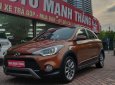 Hyundai i20 Active 1.4 AT 2015 - Cần bán Hyundai i20 Active 1.4 AT sản xuất 2015, màu nâu, xe nhập 