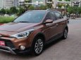 Hyundai i20 Active 1.4 AT 2015 - Cần bán Hyundai i20 Active 1.4 AT sản xuất 2015, màu nâu, xe nhập 