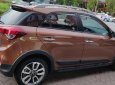 Hyundai i20 Active 1.4 AT 2015 - Cần bán Hyundai i20 Active 1.4 AT sản xuất 2015, màu nâu, xe nhập 