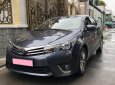 Toyota Corolla altis 1.8MT 2015 - Bán xe Toyota Altis 1.8MT 2015 màu xanh, đi 42.000 km