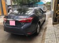 Toyota Corolla altis 1.8MT 2015 - Bán xe Toyota Altis 1.8MT 2015 màu xanh, đi 42.000 km