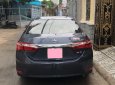 Toyota Corolla altis 1.8MT 2015 - Bán xe Toyota Altis 1.8MT 2015 màu xanh, đi 42.000 km