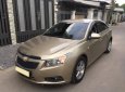 Chevrolet Cruze 2010 - Gia đình cần bán Cruze 2010, số sàn, màu vàng cát, gia đình sử dụng