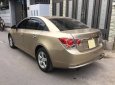 Chevrolet Cruze 2010 - Gia đình cần bán Cruze 2010, số sàn, màu vàng cát, gia đình sử dụng