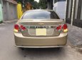 Chevrolet Cruze 2010 - Gia đình cần bán Cruze 2010, số sàn, màu vàng cát, gia đình sử dụng