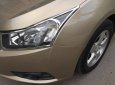 Chevrolet Cruze 2010 - Gia đình cần bán Cruze 2010, số sàn, màu vàng cát, gia đình sử dụng