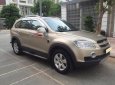 Chevrolet Captiva LT 2010 - Cần bán xe Chevrolet Captiva 2010 số sàn máy dầu, màu vàng cát