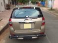 Chevrolet Captiva LT 2010 - Cần bán xe Chevrolet Captiva 2010 số sàn máy dầu, màu vàng cát