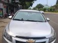 Chevrolet Cruze 2012 - Gia đình em cần bán xe Cruze đời 2012 số sàn màu bạc