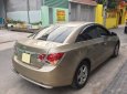 Chevrolet Cruze 2010 - Gia đình cần bán Cruze 2010, số sàn, màu vàng cát