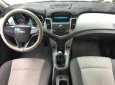 Chevrolet Cruze 2010 - Gia đình cần bán Cruze 2010, số sàn, màu vàng cát