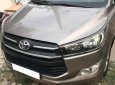 Toyota Innova 2016 - Gia đình cần bán Innova 2016, số sàn phom mới, màu hoàng kim