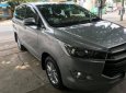 Toyota Innova 2017 - Gia đình cần bán xe Toyota Innova 2.0E 2017 số sàn màu xám bạc