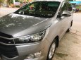 Toyota Innova 2017 - Gia đình cần bán xe Toyota Innova 2.0E 2017 số sàn màu xám bạc