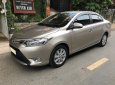 Toyota Vios 2017 - Gia đình cần bán xe Toyota Vios 2017, số tự động, màu vàng cát