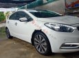 Kia K3   2.0 AT	  2014 - Cần bán xe Kia K3 2.0 AT đời 2014, màu trắng, xe đẹp