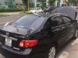 Toyota Corolla altis   2010 - Bán xe Toyota Corolla Altis đời 2010, màu đen, còn rất mới