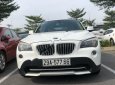 BMW X1 2011 - Chính chủ bán BMW X1 màu trắng, đời 2011, đăng ký lần đầu T7/2012, chạy 7,8 vạn